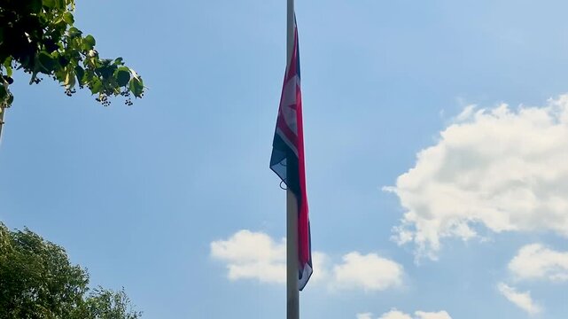 The national flag of the Democratic People's Republic of Korea (North Korea).
