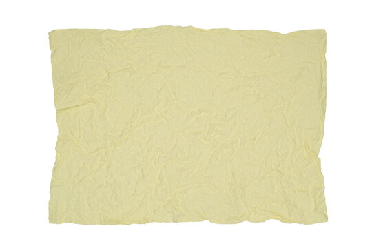 crumpled rectangular pale yellow paper sheet on white background