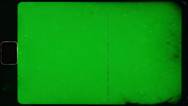 Aged, dusty green screen film frame with sprocket hole and scratch marks