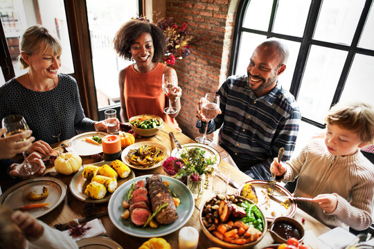 People Celebrating Thanksgiving Holiday Tradition Concept