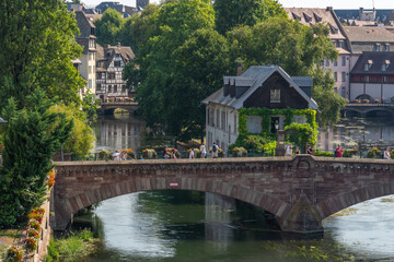 Fototapeta premium Panorama from the popular Petite France district is known for its cobblestone streets, canals, and well-preserved half-timbered houses, including Maison des Tanneurs, beautiful town for sightseeing