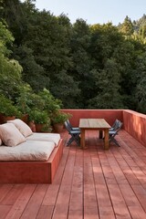 Obraz premium Red outdoor terrace with built in sofa, wooden table and potted plants for patio background and outdoor design