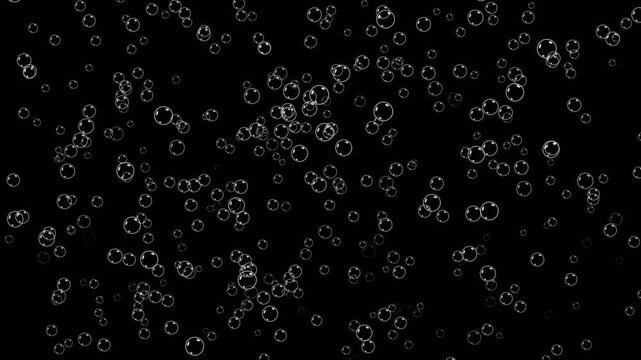 Water bubbles moving from bottom to top. Rising bubbles under transparent water. Rising air bubbles on black background. Gas bubbles floating of champagne. Soap bubbles fly up overlay in close up.