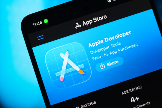 In this photo illustration, the Apple Developer logo is seen displayed on a smartphone screen in the Apple app store.
