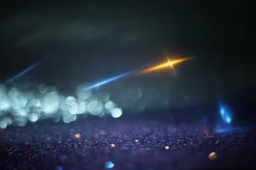 Abstract background of soft focus bokeh lights © tomertu