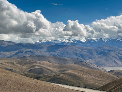 Mount Everest and valley among the clouds in the Mount Everest National Reserve, Qomolangma Nature Reserve,Tibet, China
