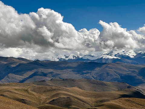 Mount Everest and valley among the clouds in the Mount Everest National Reserve, Qomolangma Nature Reserve,Tibet, China