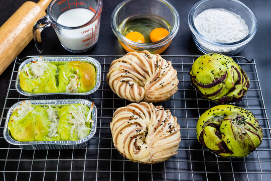 Assorted Homemade Artisan Bread with Pandan Coconut Loaf, Sweet Swirl Buns and Purple Sweet Potato Bread