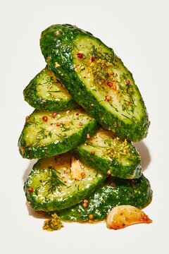 Close Up Ukrainian Pickled Cucumber Slices Stack with Garlic and Dill Editorial Food Photography