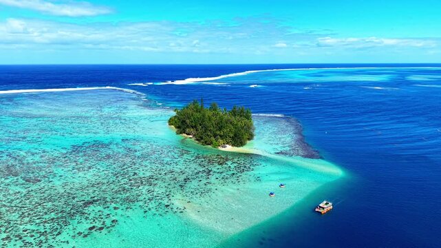 Cinematic drone orbit around tropical island and coral reef in Bora Bora, French Polynesia