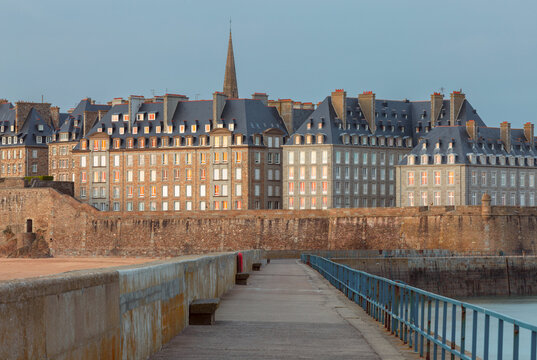 Historic Stone Buildings and City Walls at Sunset in Saint Malo, France