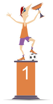 Football player with a winner cup standing on the podium of the winner