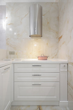 Saucepan on electric stove in kitchen