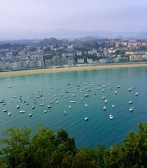 Fototapeta premium Pleasure Boats in La Concha Bay, San Sebastian (Donostia), Basque Country, Spain – Morning View from Mount Urgull