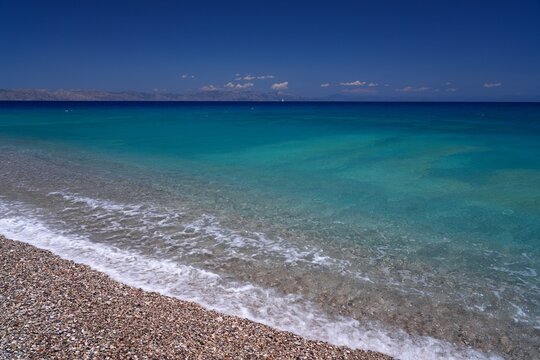 Paralia Enidriou Beach in Rhodes town in Greece. Rhodes coast landscape in sunny weather. Greek Island.