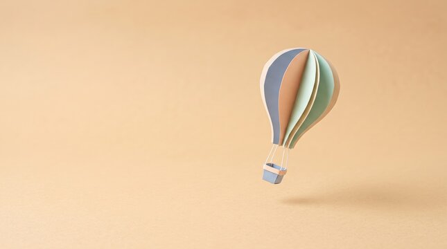 Colorful paper hot air balloon floating against a soft beige background in a minimalist design