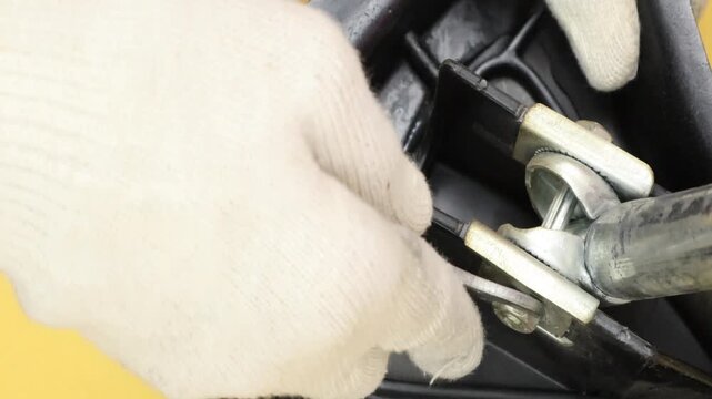 Tighten the bolt with a wrench to the tube clamp under the bicycle seat post