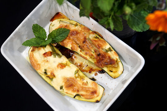 Casserole with zucchini au gratin - Vegan food with vegetables out of the kitchen