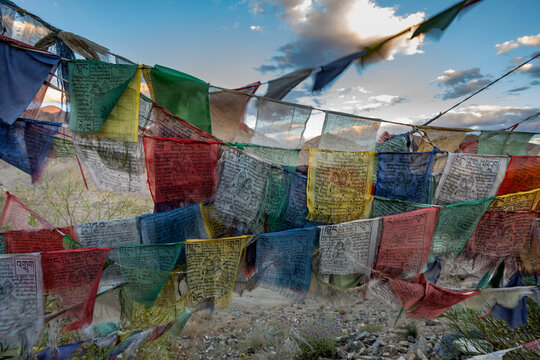Colorful Tibetan prayer flags strung in the Himalyan Mountians