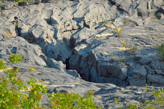 forre laviche del Simeto: ancient basalt where flowing Simeto River, Adrano, Sicily, Italy 