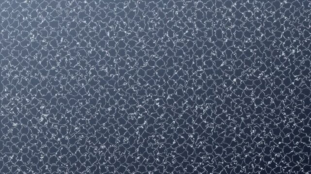 Close up view of dark blue textured surface with subtle grain pattern.