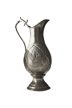 Ornate antique silver ewer isolated PNG on transparent background, engraved vintage metal pitcher with decorative handle for historical and luxury design
