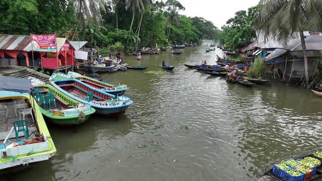 Traditional floating market with farmers selling fresh produce