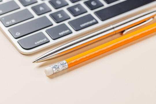 Office supplies on beige desk