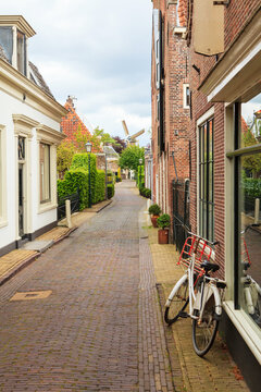 Streets of Dutch village with windmill