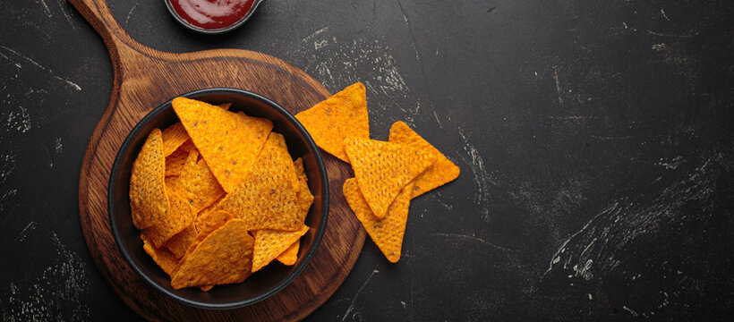 Nachos tortilla chips salsa dip wooden board Mexican Tex-Mex snack fast food copy space