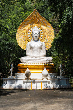 Phra Phuttha Metta, a white Buddha statue at Wat Tham Phra Phothisat in Saraburi, Thailand.