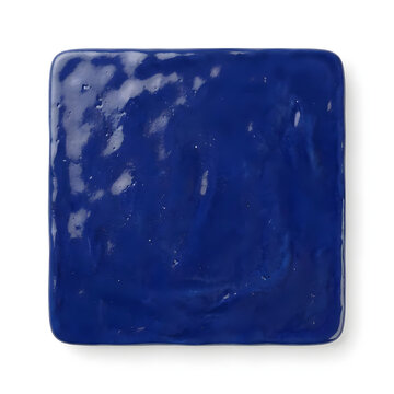 Glossy deep blue glazed ceramic tile.