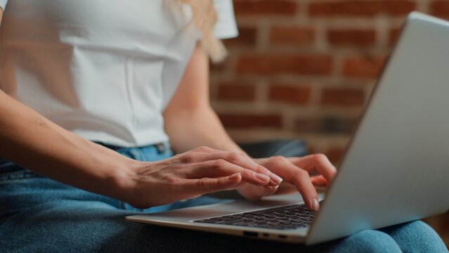 Unrecognizable Caucasian business woman typing laptop close up female hands chatting with computer keyboard unknown businesswoman working online with wireless device buying with e-commerce shopping