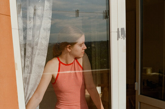 Young woman in her city apartment


