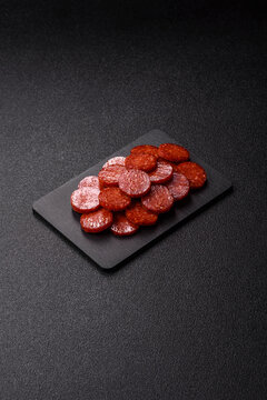 Slices of smoked pepperoni or salami for making homemade pizza. Sliced pepperoni