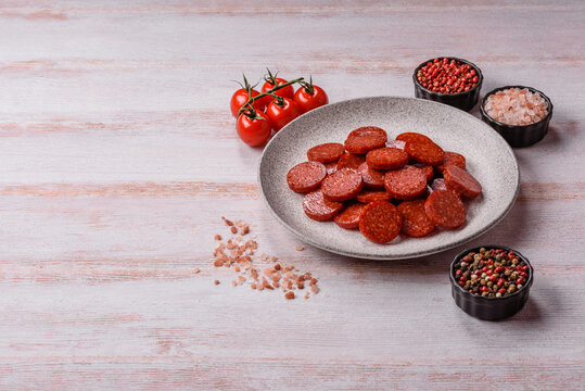 Slices of smoked pepperoni or salami for making homemade pizza. Sliced pepperoni