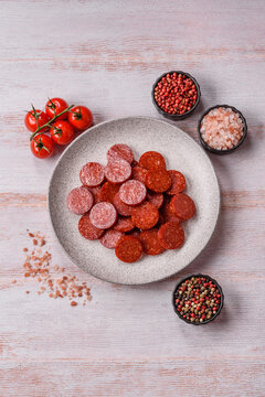 Slices of smoked pepperoni or salami for making homemade pizza. Sliced pepperoni