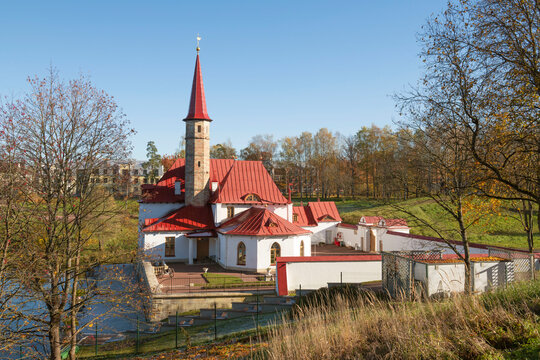 The ancient Priory Palace in an autumn landscape on a warm October day. Gatchina, Leningrad oblast, Russia