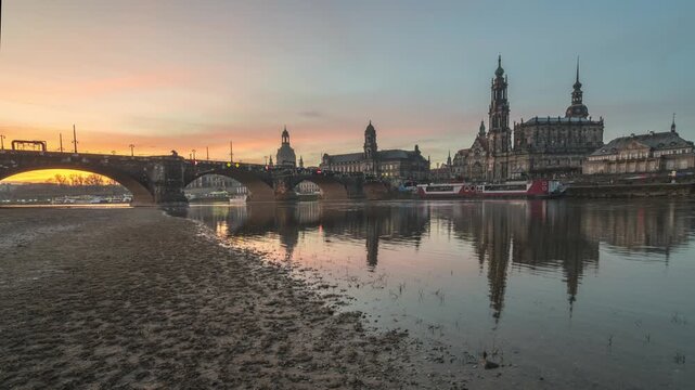 Dresden Germany time lapse sunrise city skyline at Elbe River and Augustus Bridge
