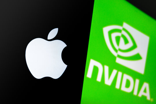 Raleigh, North Carolina - August 2, 2026: Apple logo and Nvidia logo on contrasting black and green backgrounds