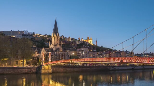 Lyon France time lapse night city skyline at Red footbridge Passerelle St Georges (Le Tronc de Lyon)