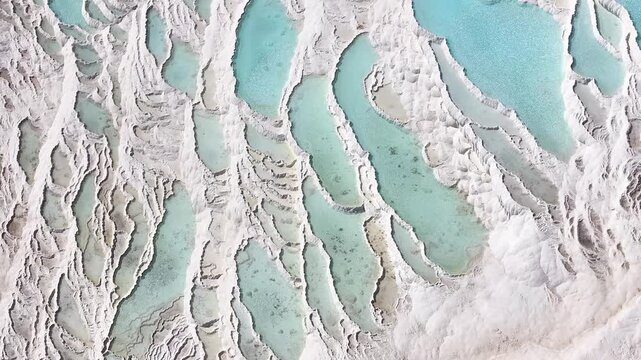 An aerial view of the Pamukkale Travertines. Pamukkale Travertines Drone Video, Pamukkale Denizli, Turkiye (Turkey)	