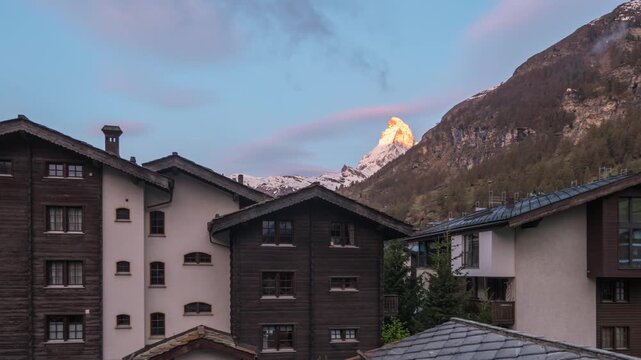 Zermatt Switzerland sunrise time lapse of Matterhorn mountain peak and village
