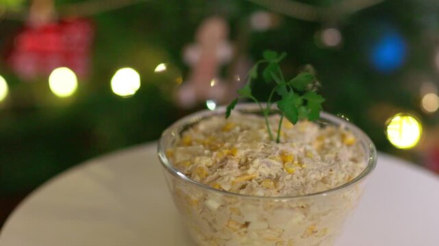 Delicious Creamy Salad with Parsley Against Festive Christmas Tree Background