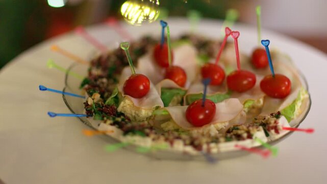 Festive Plate of Gourmet Appetizers with Cherry Tomatoes and Meat Skewers