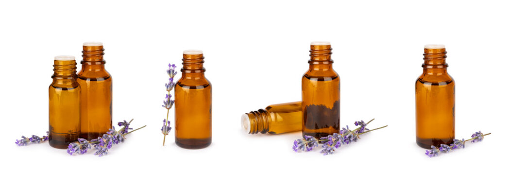 Lavender essential oil in glass bottles isolated on white background with fresh lavender fowers. Natural aromatherapy. Organic skincare. Herbal cosmetic serum. Spa wellness treatment. Botanical 