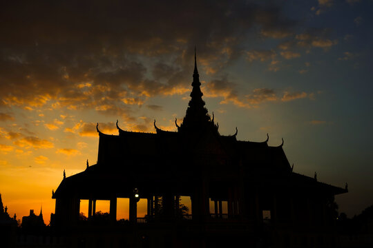 Sunset over the city of Phnom Penh, silhouette of  the Royal palace when sun down.