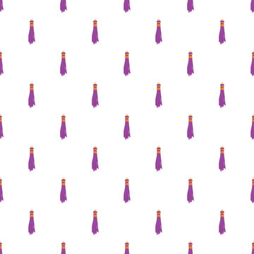 Tassels with purple fringe and colorful accents form a repeating design