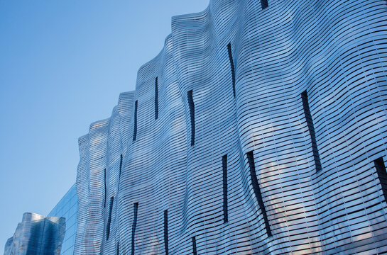 Unique iron design of facade in business, art and shopping mall Stary Browar in Poznan, Poland under clear blue sky on 4th of March, 2026 in Poznan, Poland