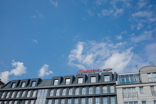 Hamptons by Hilton hotel building facade exterior in Poznan city downtown in Poland on a sunny day with clear sky on 23rd of March 2026 in Poznan, Poland